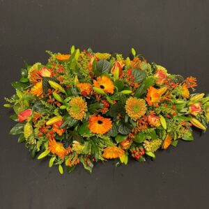 oranje rouwtoef , gerbera, lelie ,kangoeroe,roos, Solidago,groensoorten